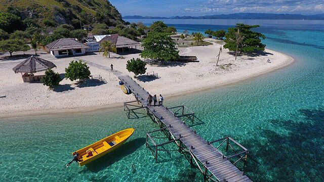 Kanawa Island is a small tropical paradise located in the Flores Sea, off the coast of Flores Island in Indonesia. The island is known for its crystal-clear waters, white sandy beaches, and vibrant coral reefs, making it a popular destination for diving and snorkeling enthusiasts. Despite its natural beauty, the island remains relatively unknown and unspoiled, making it a hidden gem in Indonesia.